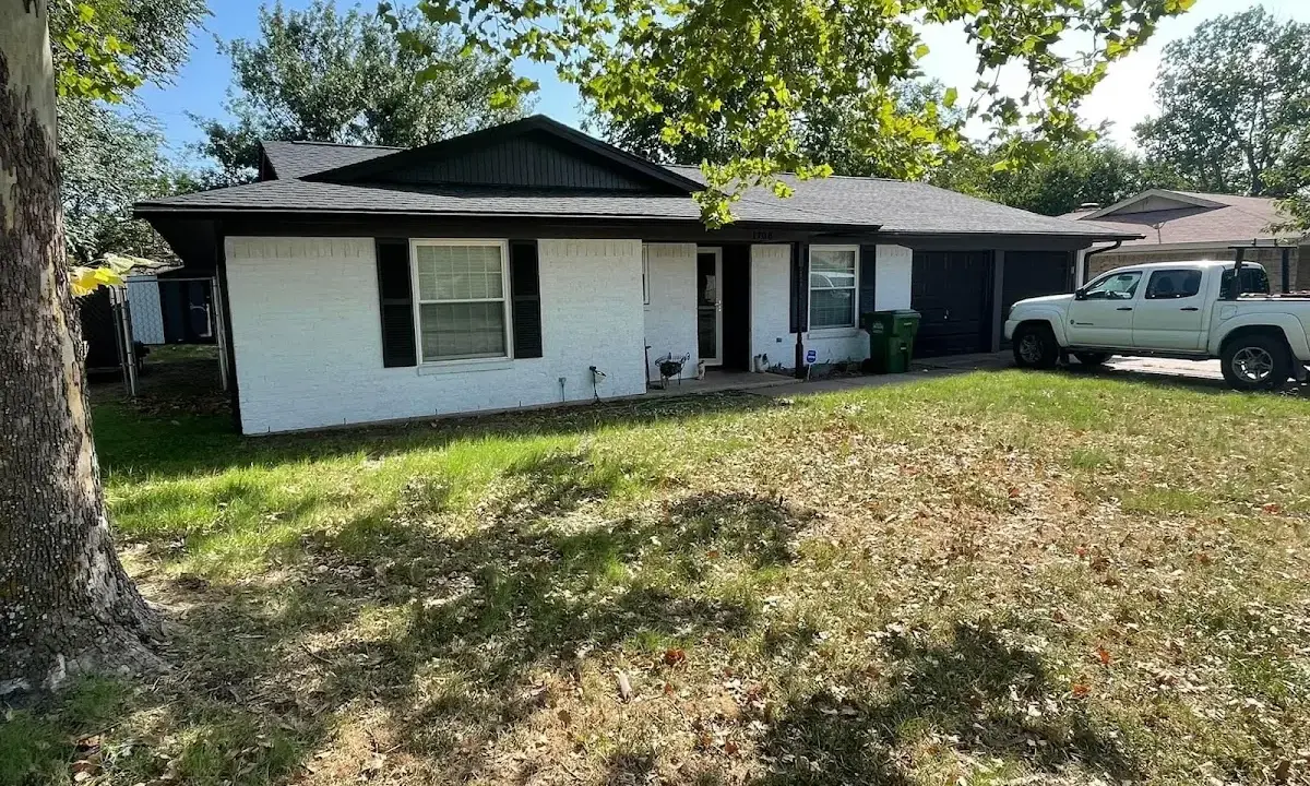 Professional roofing crew working on a residential roof in Citrus Park